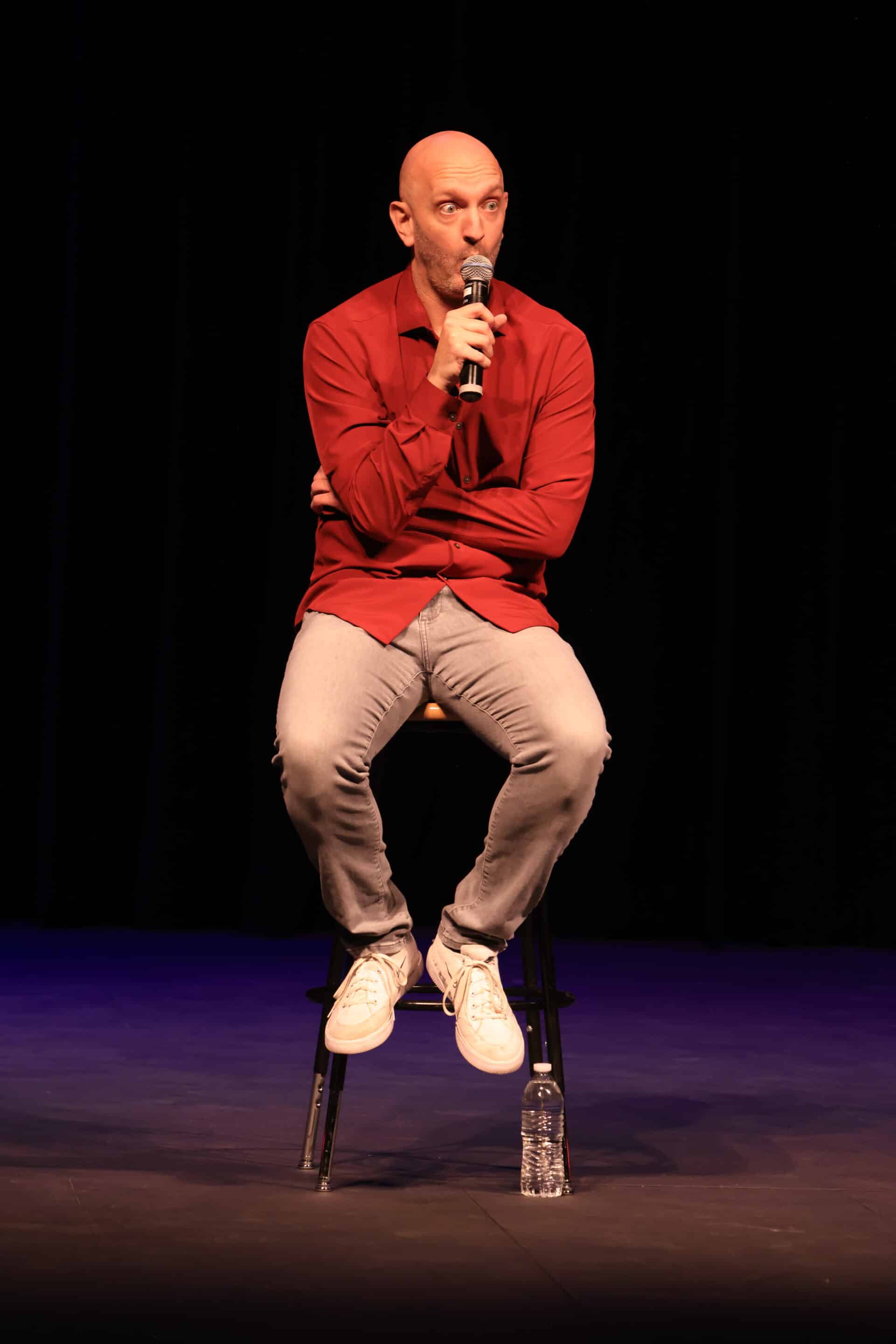 Paul Green Comedy Sitting During a routine in Vail Arizona